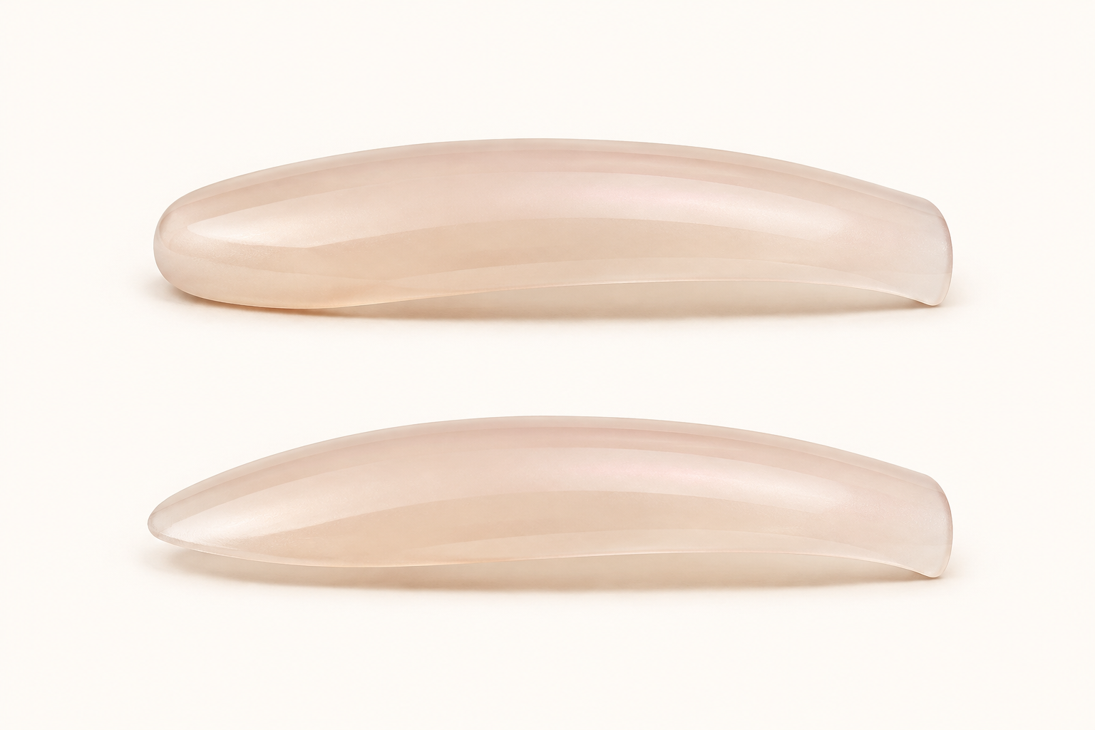 Two three-dimensional nail shells in side profile: a uniform root above and a thinner cuticle-side root below; cuticle side is on the left